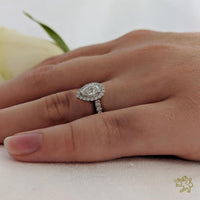 Skye Pear Halo 0.30ct E SI1 Diamond Platinum Ring