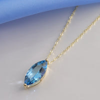 Blue Topaz Marquise 9ct Yellow Gold Necklace