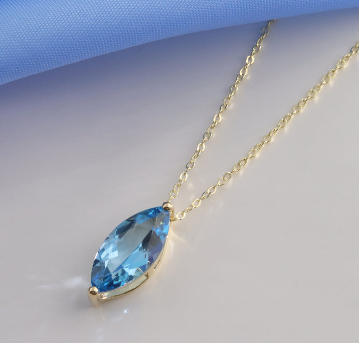 Blue Topaz Marquise 9ct Yellow Gold Necklace